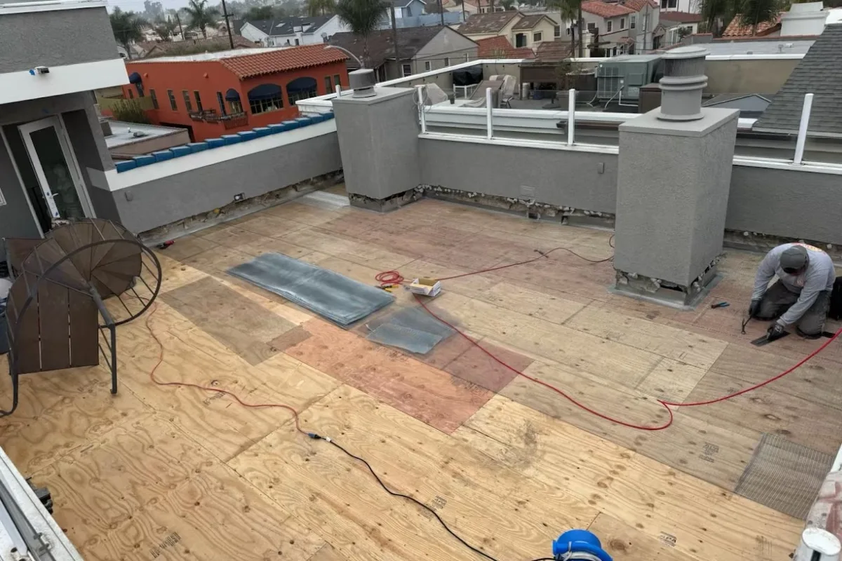 Preparing a wood deck surface for a protective coating